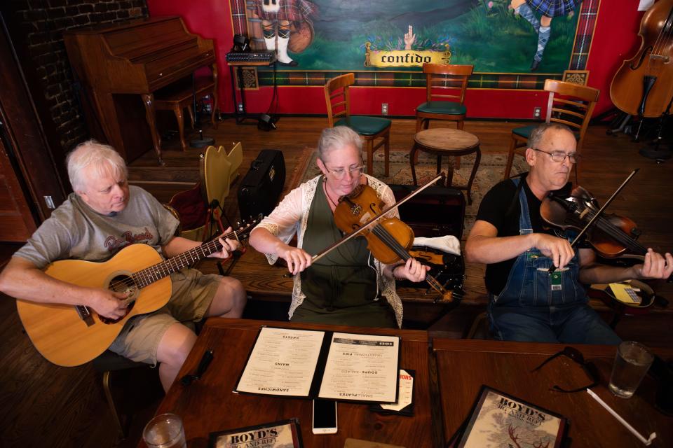 The Old Time Jam is open to all lovers and players of music. Here, Pirkle plays the fiddle with friends in a September 2023 session.