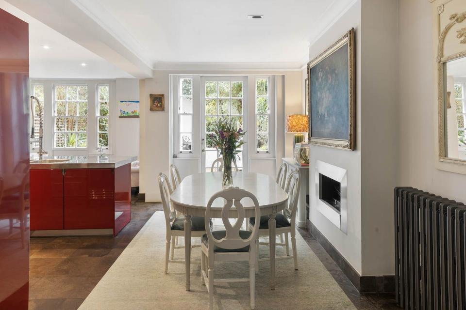 a dining room with a fireplace