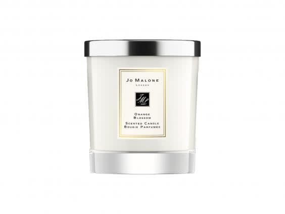 Light a scented candle and switch off from your to-do list before you start your facial (Jo Malone London)