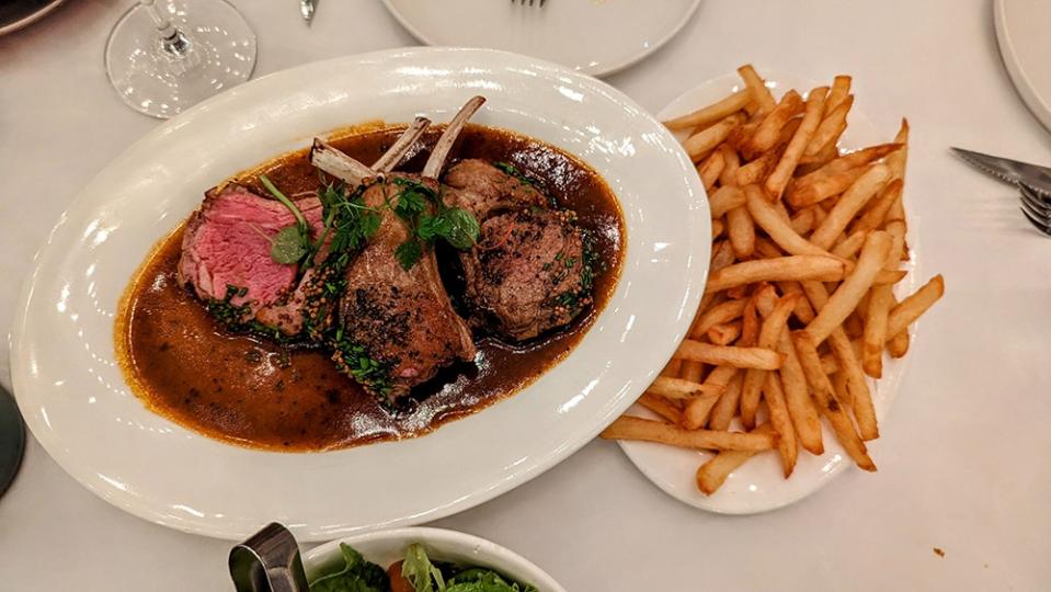 The 'carre d'agneau', or rack of lamb, is another delicious main here. Just to be clear, the fries here are from the 'steak frites', but that probably won't stop your date from snagging some.