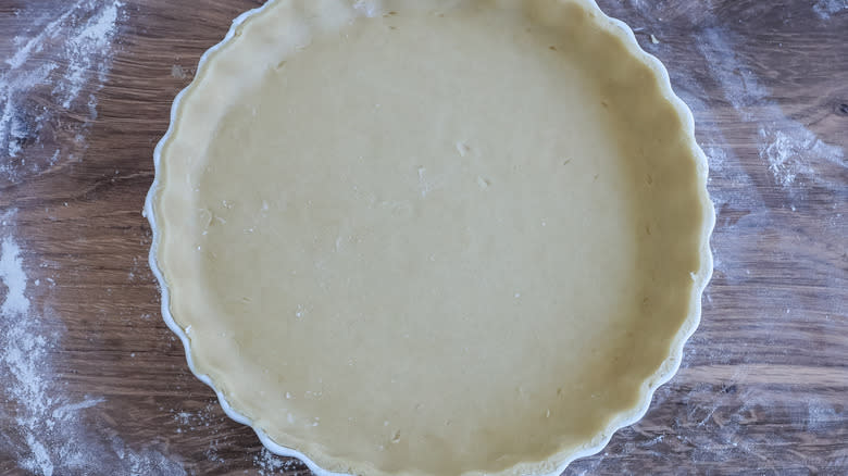 quiche dough in a pan