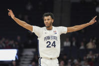 Penn State forward Zach Hicks gestures after making a 3-point basket against Michigan during the second half of an NCAA college basketball game in the first round of the Big Ten Conference men's tournament Wednesday, March 13, 2024, in Minneapolis. (AP Photo/Abbie Parr)