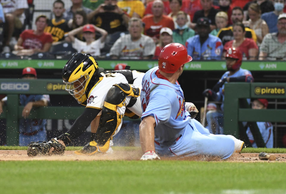 Pittsburgh Pirates catcher Michael Perez forces out St. Louis Cardinals' Paul Goldschmidt during the third inning of a baseball game Saturday, Aug. 28, 2021, in Pittsburgh. (AP Photo/Philip G. Pavely)