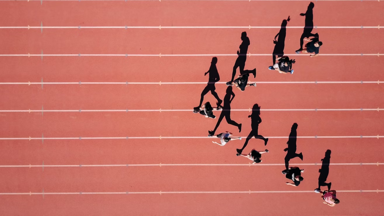  Top-down shot of track runners in training. 