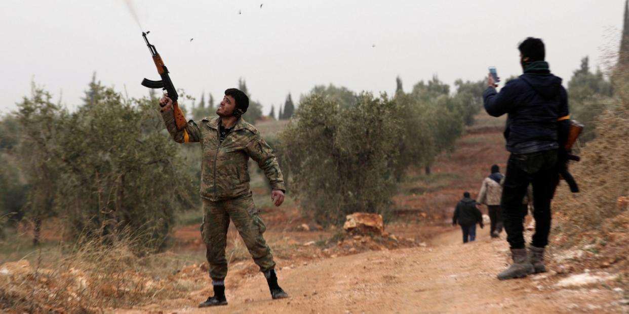 Turkish-backed FSA rebel shoots into air in Afrin, Syria