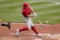 Philadelphia Phillies' J.T. Realmuto hits a double off Pittsburgh Pirates starting pitcher Mitch Keller, driving in a run, during the fifth inning of a baseball game in Pittsburgh, Sunday, Aug. 1, 2021. (AP Photo/Gene J. Puskar)