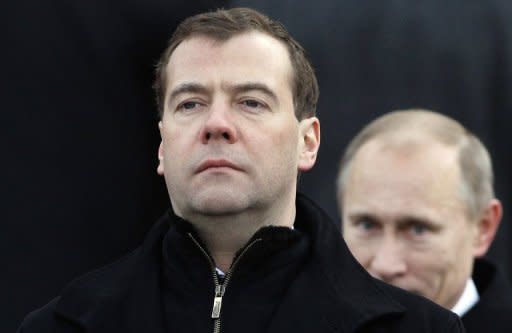 Russian President Dmitry Medvedev and Prime Minister Vladimir Putin review honour guards in Moscow. When Putin returns to the presidency on May 7, post-Soviet Russia is set to remember its only one-term president as a man whose biggest achievement was keeping the Kremlin seat warm for Putin when he was barred by the constitution from running for a third consecutive term