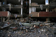 <p>In this photo provided by the Iranian Students News Agency, ISNA, a car lays smashed by debris from the earthquake at the city of Sarpol-e-Zahab in western Iran, Nov. 13, 2017.(Photo: Farzad Menati/Tasnim News Agency via AP) </p>