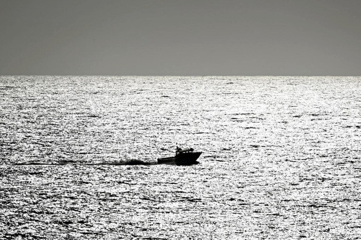 Un bateau dans l'océan Pacifique (Image d'illustration).  - Credit:TAYFUN COSKUN / ANADOLU AGENCY / Anadolu Agency via AFP
