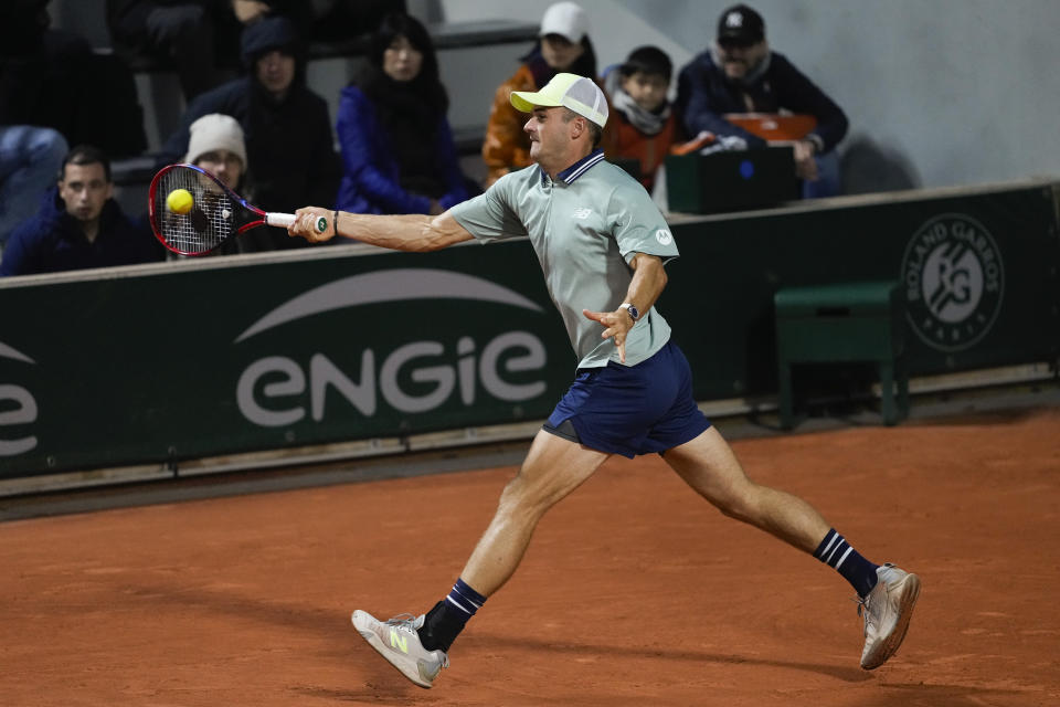 Tommy Paul of the U.S. plays a shot against Argentina's Francisco Cerundolo during their third round match of the French Open tennis tournament at the Roland Garros stadium in Paris, Saturday, June 1, 2024. (AP Photo/Thibault Camus)