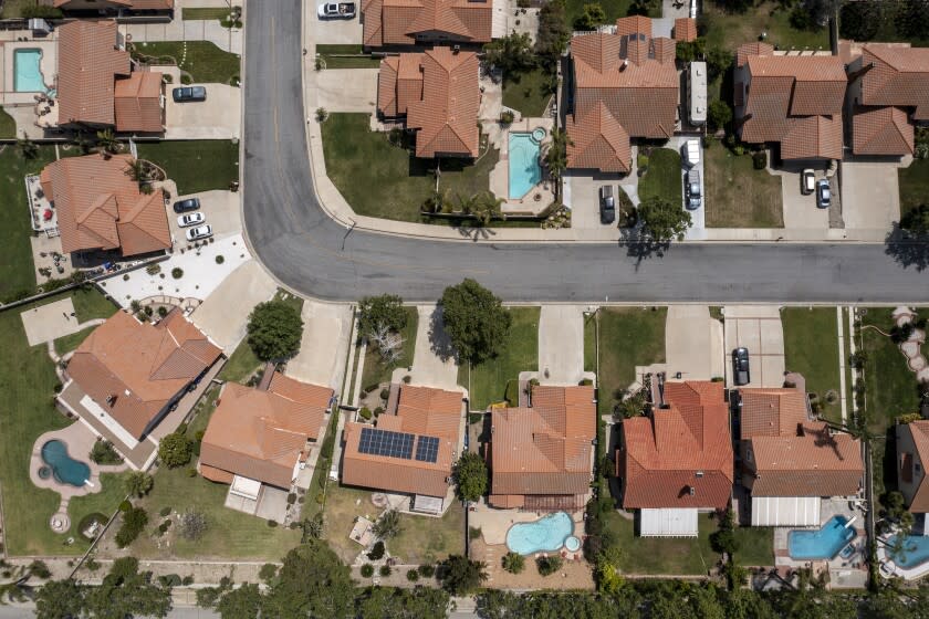 Rancho Cucamonga, CA, Wednesday, April 27, 2022 - A drone image over a housing tract that is part of the state water project, where outdoor watering to one day a week. Water Shortage Emergency to be declared in communities in Los Angeles, San Bernardino and Ventura counties, home to 6 million Southern Californians. These homes are located near the intersection of Wilson and Milliken Avenues. (Robert Gauthier/Los Angeles Times)