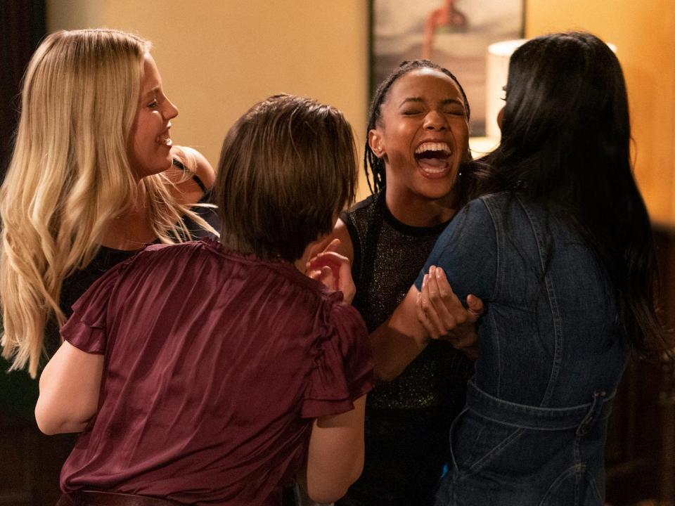 Reneé Rapp, Pauline Chalamet, Alyah Chanelle Scott, and Amrit Kaur laughing together on "The Sex Lives of College Girls."