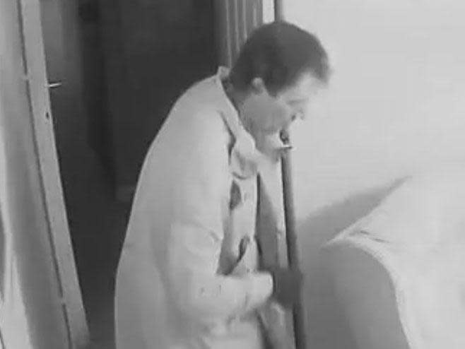 CCTV shows burglar creeping around bedroom while 90-year-old woman lies awake in bed