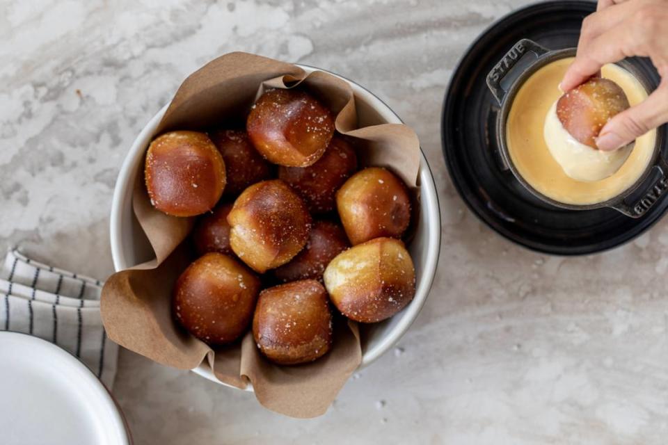 A popular menu item at Culinary Dropout, opening next year in Charlotte’s South End, are soft homemade pretzels with provolone cheese fondue.