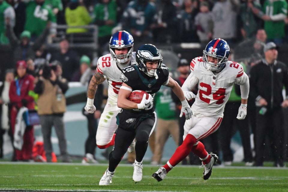 Dec 25, 2023; Philadelphia, Pennsylvania, USA; Philadelphia Eagles wide receiver Britain Covey (18) returns a punt against the New York Giants during the first quarter at Lincoln Financial Field. Mandatory Credit: Eric Hartline-USA TODAY Sports