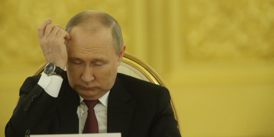 Vladimir Putin scratching his head.