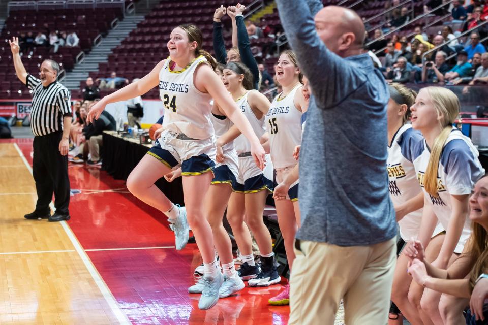 The Greencastle-Antrim bench react to a shot late in the fourth quarter of the District 3 Class 5A girls' basketball championship against York Suburban at the Giant Center on March 2, 2023, in Derry Township. The Blue Devils won, 44-30.