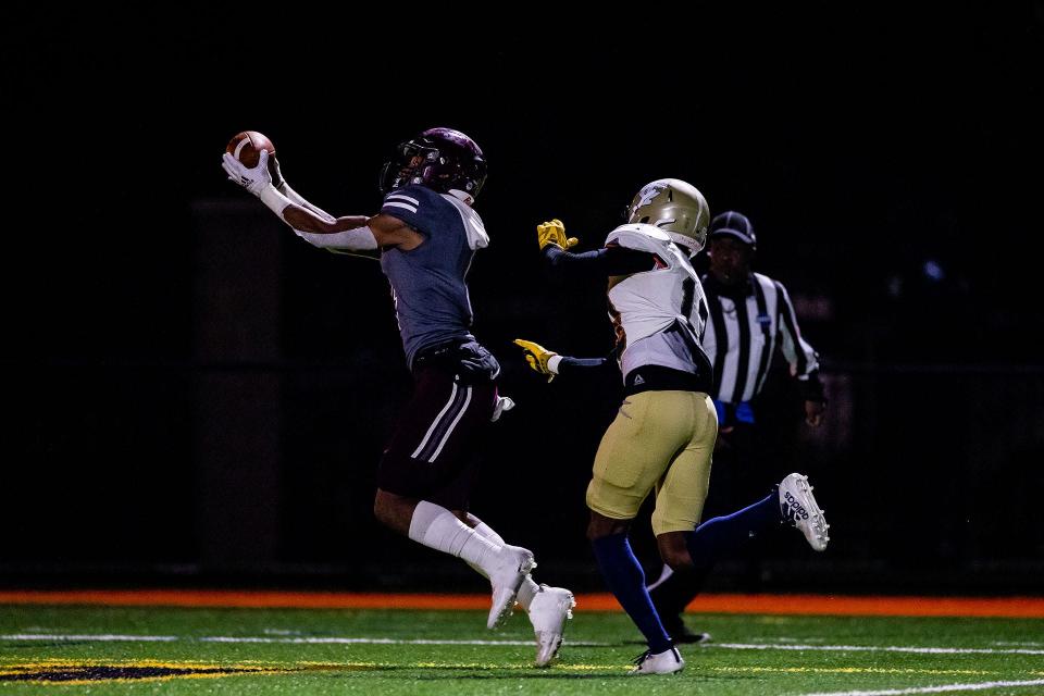Benedictine's Justin Thomas makes an interception against Thomas County Central in the first round of the Class 4A playoffs Nov. 12 at Memorial Stadium.