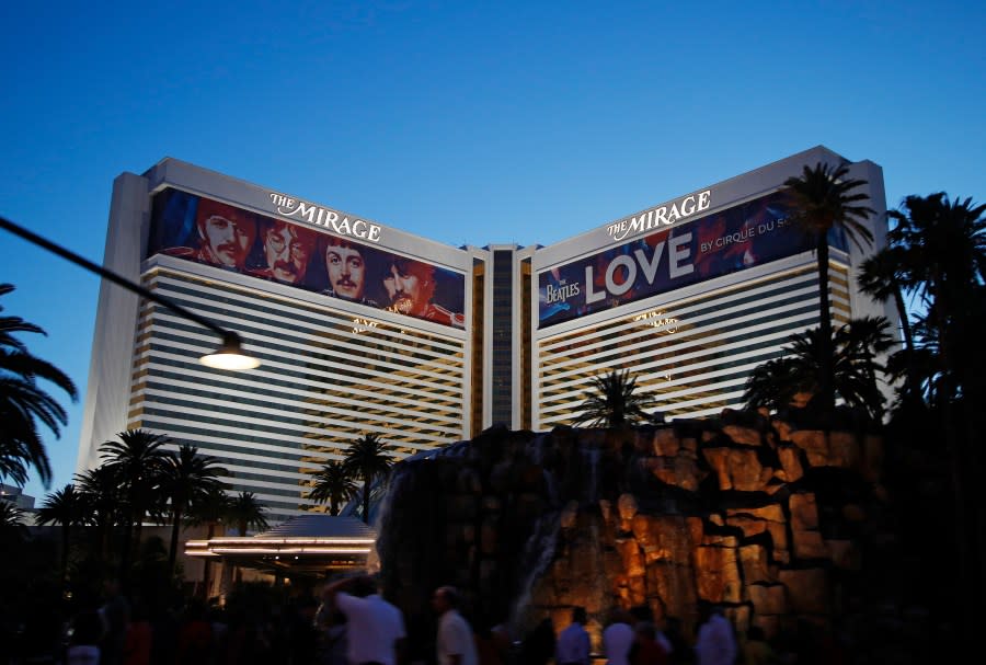 <em>FILE – The Mirage Hotel and casino is seen on May 3, 2018, in Las Vegas. Casino giant MGM Resorts International said Monday, Dec. 13, 2021, that it is selling operations of The Mirage hotel on the Las Vegas Strip to Hard Rock International in a cash deal worth almost $1.1 billion. (AP Photo/John Locher, File)</em>