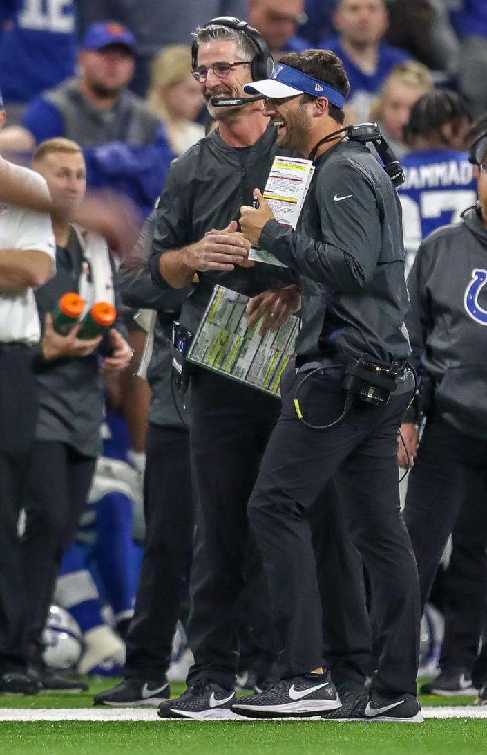 Indianapolis Colts head coach Frank Reich celebrates with offensive coordinator Nick Sirianni after a late touchdown against the Tennessee Titans at Lucas Oil Stadium in Indianapolis, on Sunday, Nov. 18, 2018.