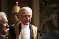 Lord Speaker Norman Fowler speaks to dignitaries in the Norman Porch at the Palace of Westminster and the Houses of Parliament at the State Opening of Parliament ceremony in London, Monday, Oct. 14, 2019. (AP Photo/Matt Dunham, Pool)