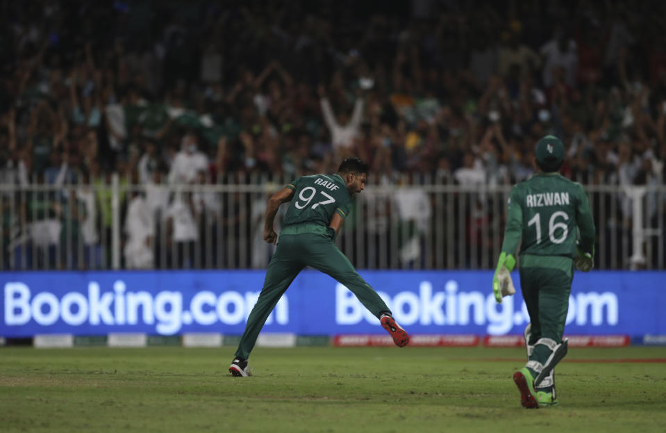 Pakistan's Haris Rauf celebrates the dismissal of New Zealand's Glenn Phillips during the Cricket Twenty20 World Cup match between New Zealand and Pakistan in Sharjah, UAE, Tuesday, Oct. 26, 2021. (AP Photo/Aijaz Rahi)