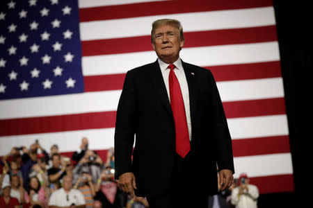 FILE PHOTO: U.S. President Donald Trump arrives at a Make America Great Again Rally at the Florida State Fairgrounds in Tampa, Florida, U.S., July 31, 2018. REUTERS/Carlos Barria