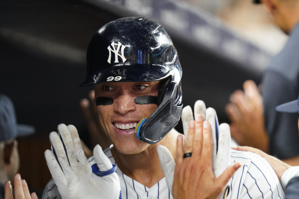 New York Yankees' Aaron Judge celebrates with teammates after hitting a grand slam last week against the Royals. (AP Photo/Frank Franklin II)