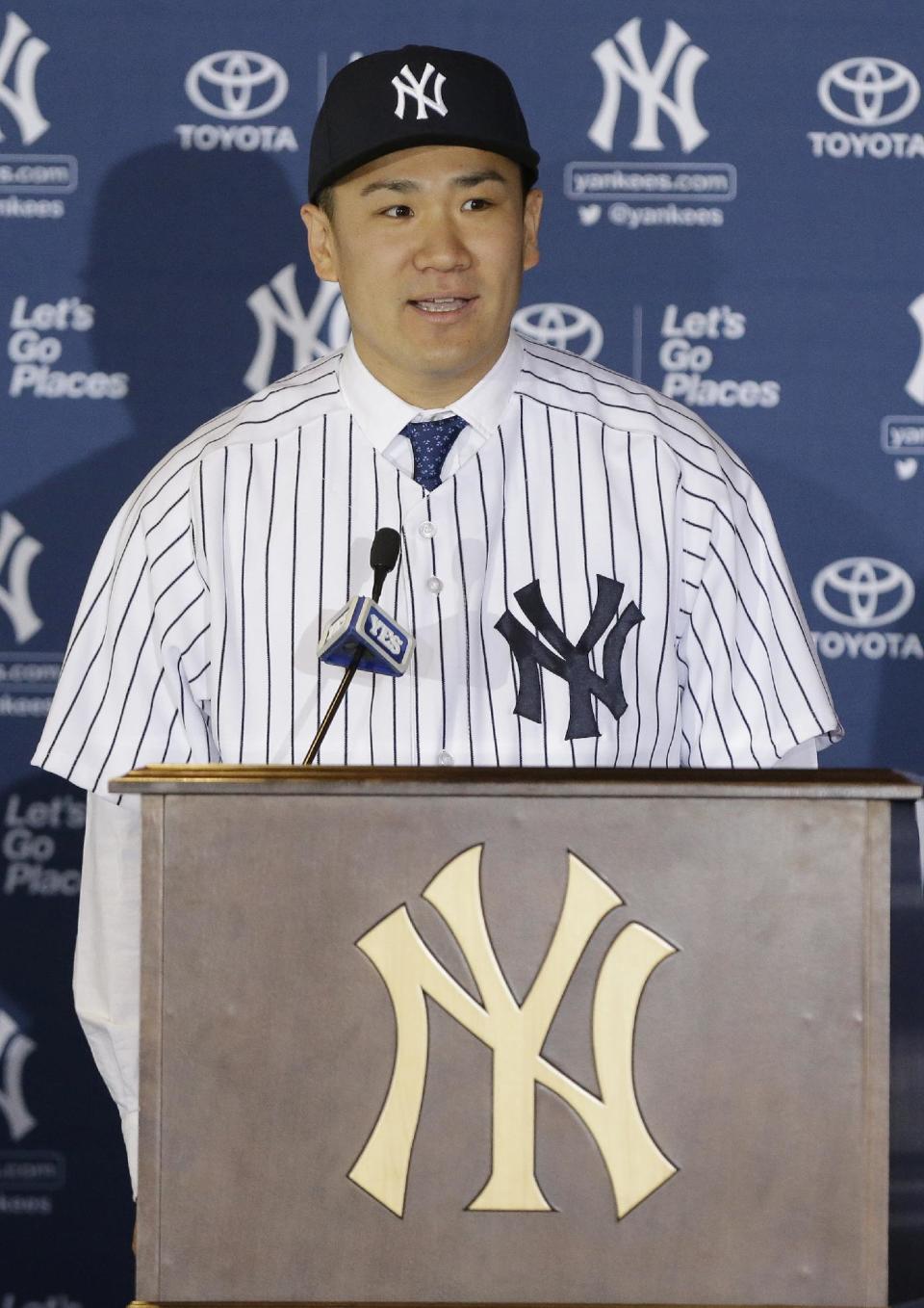 New York Yankees pitcher Masahiro Tanaka, of Japan, speaks during a news conference at Yankee Stadium Tuesday, Feb. 11, 2014, in New York. (AP Photo/Frank Franklin II)