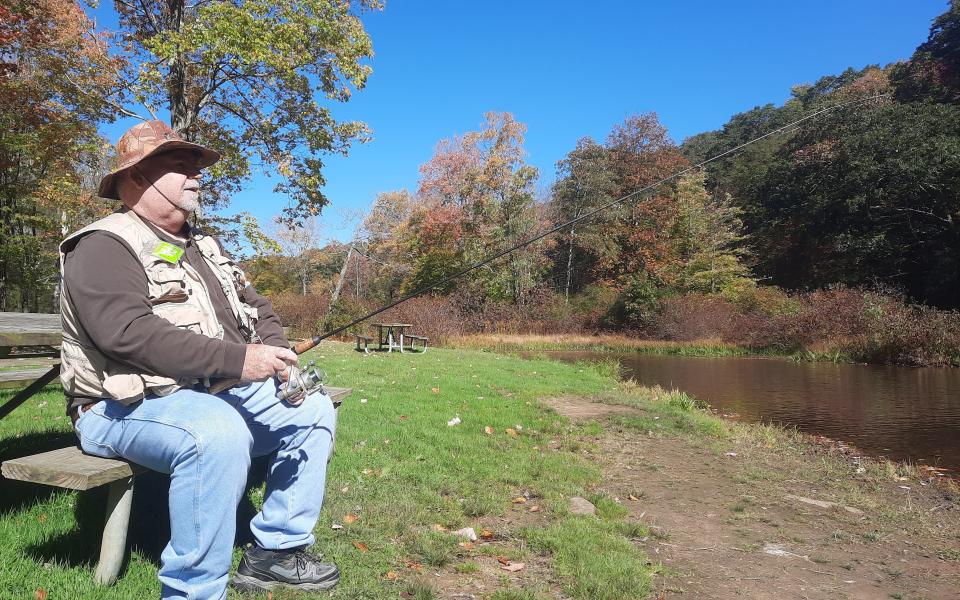 Dave Porterfield of South Connellsville fishes for trout Oct. 11 at Laurel Hill Lake in Somerset County. Fishing licenses for 2024 went on sale Dec. 1 across the state.