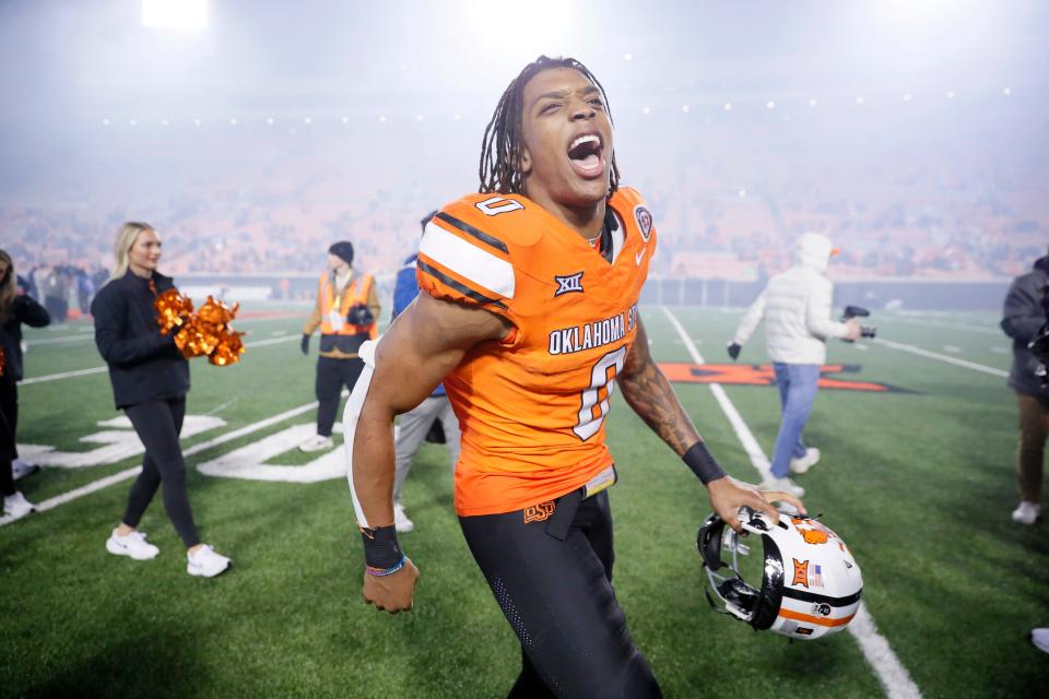 OSU running back Ollie Gordon II (0) celebrates after a 45-13 win against Cincinnati on Oct. 28 at Boone Pickens Stadium in Stillwater.