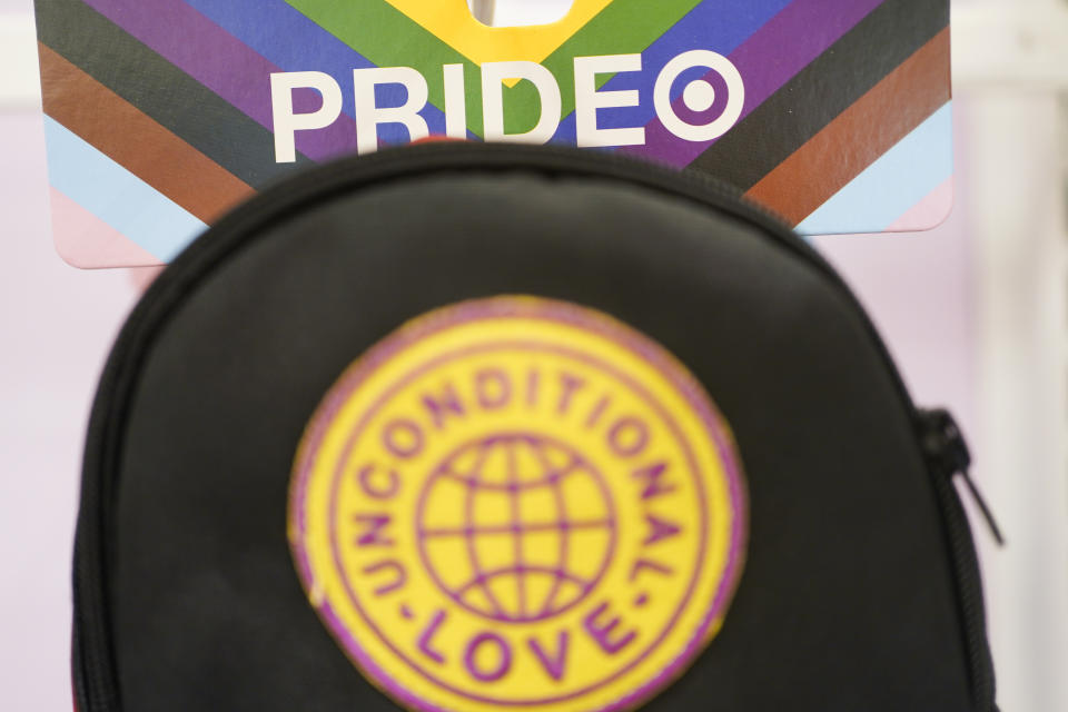 Pride month merchandise is displayed at the front of a Target store in Hackensack, N.J., Wednesday, May 24, 2023. Target is removing certain items from its stores and making other changes to its LGBTQ+ merchandise nationwide ahead of Pride month, after an intense backlash from some customers including violent confrontations with its workers. (AP Photo/Seth Wenig)