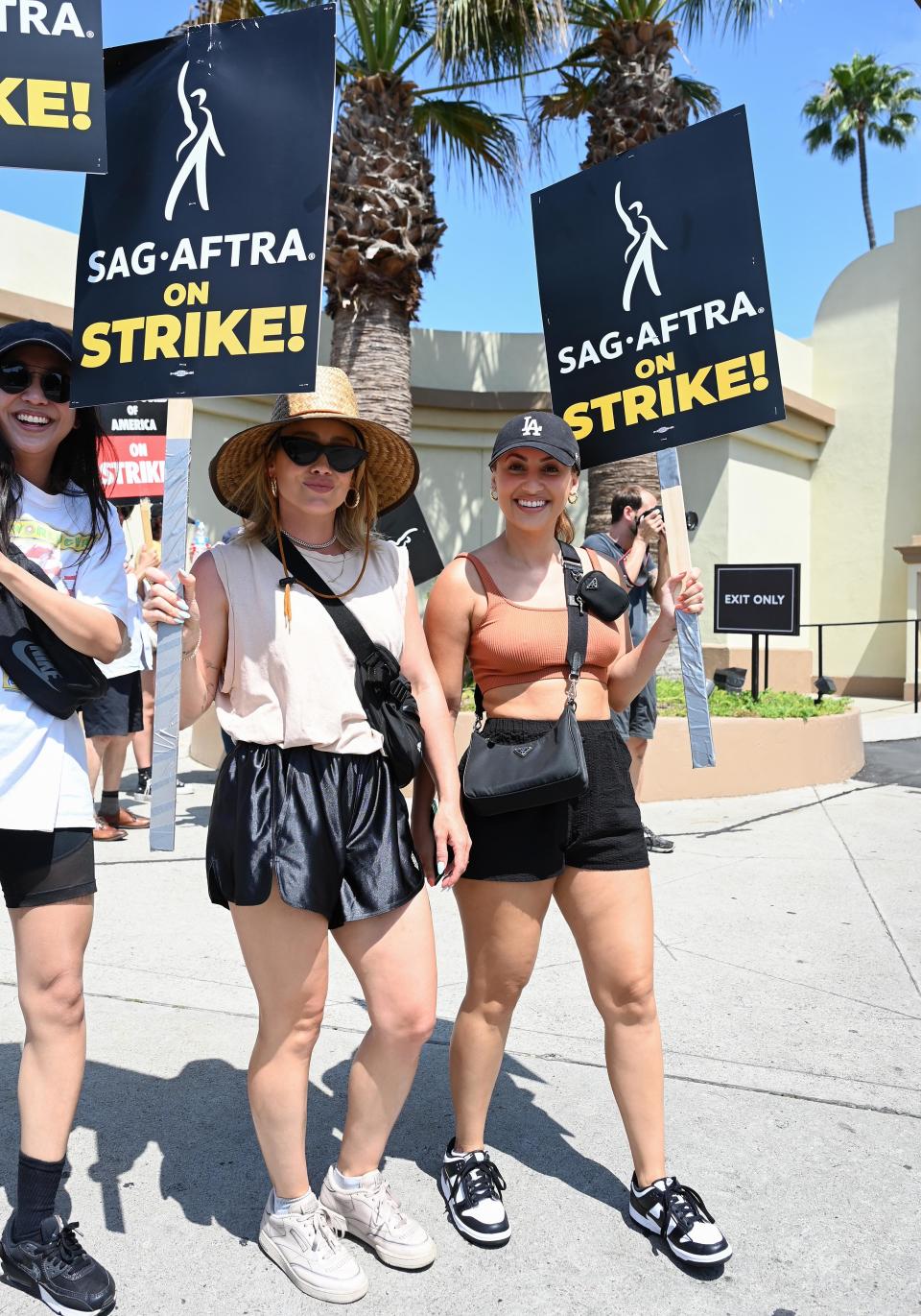 Tien Tran, Hilary Duff, and Francia Raisa picketed on July 17 in Los Angeles.