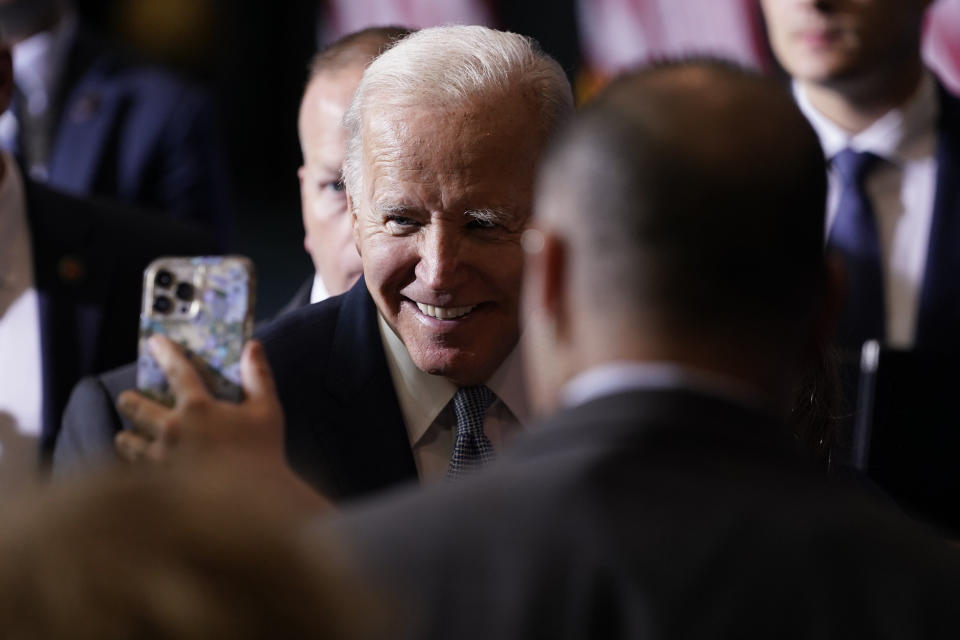 FILE - President Joe Biden poses for photographs after speaking about lowering costs for American families at the East Portland Community Center in Portland, Ore., Oct. 15, 2022. (AP Photo/Carolyn Kaster, File)