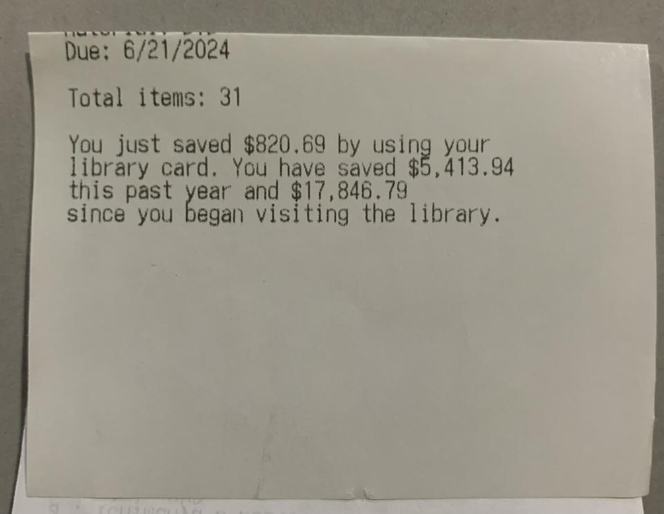 Library receipt showing savings: Total items: 31. You've saved $820.69 using your library card. Annual savings $5,413.94, total savings $17,846.79