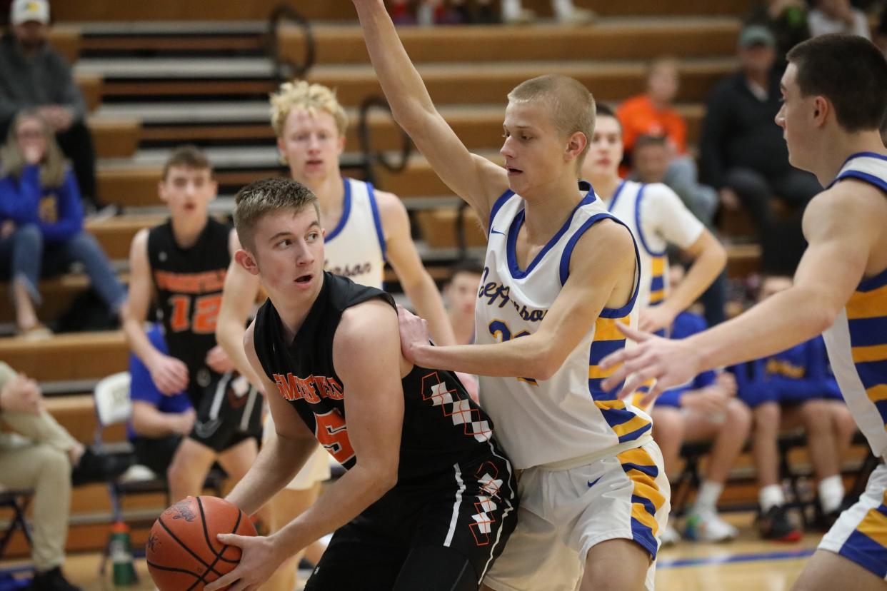 Ben Merkel of Jefferson pressures Summerfield’s Bryce Kalb on the baseline during a 57-40 Summerfield win Tuesday night.