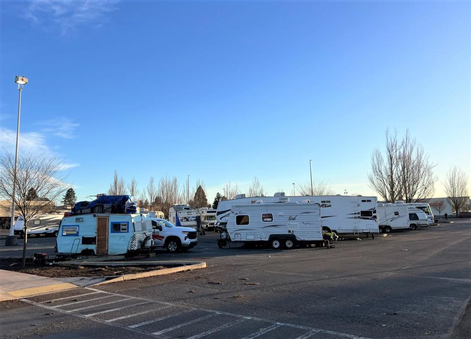 RVs camping in a parking lot March 15 in the 1200 block of Lancaster Drive NE near Coastal Farm & Ranch and WinCo Foods.