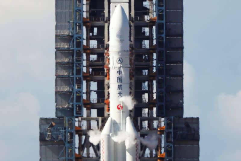 The Long March 5 Y-4 rocket carrying an unmanned Mars probe is seen before the launch at Wenchang Space Launch Center