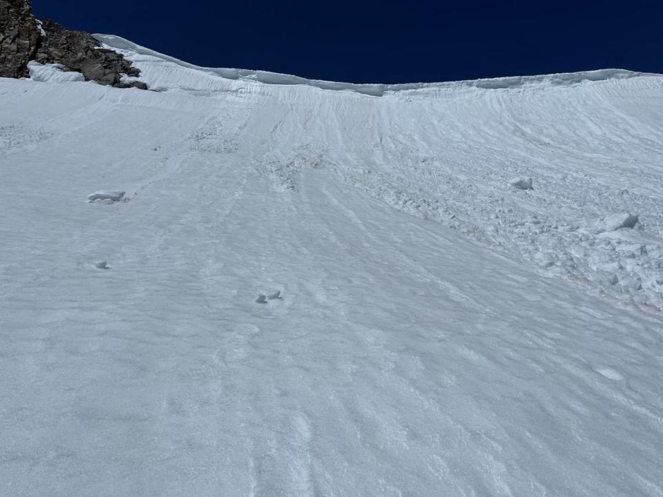 Clovis ski mountaineer Ryan Soares encountered this dangerous overhanging cornice on his way up to Copper Mine Pass while completing the Sierra High Route in the Fastest Known Time. Fortunately, a section of the cornice had fallen away allowing Soares to climb over it with crampons.