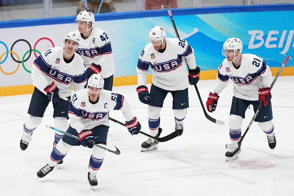 Players of Team United States celebrate a goal during the second period of the Men's Ice Hockey Preliminary Round Group A match between Team Canada and Team United States on Day 8 of the Beijing 2022 Winter Olympic Games at National Indoor Stadium on February 12, 2022 in Beijing, China.