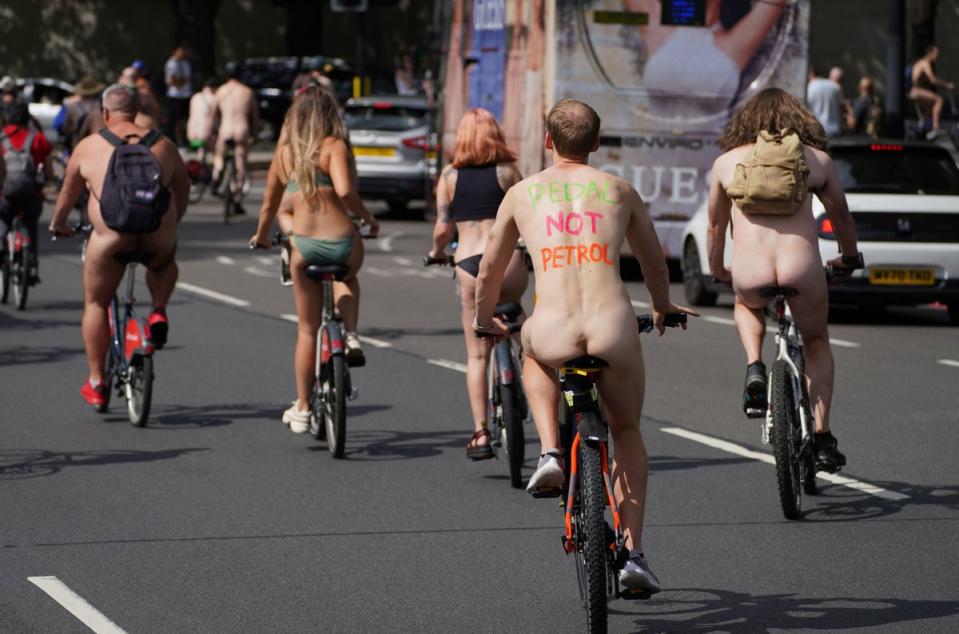 Cyclists near Hyde Park, central London, take part in the World Naked Bike Ride London 2021 (PA)