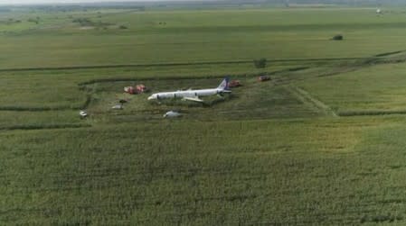 A view shows a passenger plane following an emergency landing near Moscow