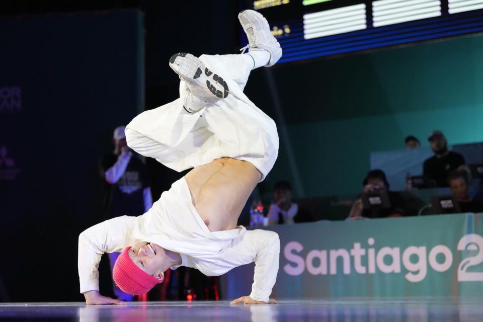 Canada's Phil Wizard competes against Gravity, of the United States, in the B-boys semi-finals break dancing competition at the Pan American Games in Santiago, Chile on Saturday, Nov. 4, 2023. (Frank Gunn/The Canadian Press via AP)