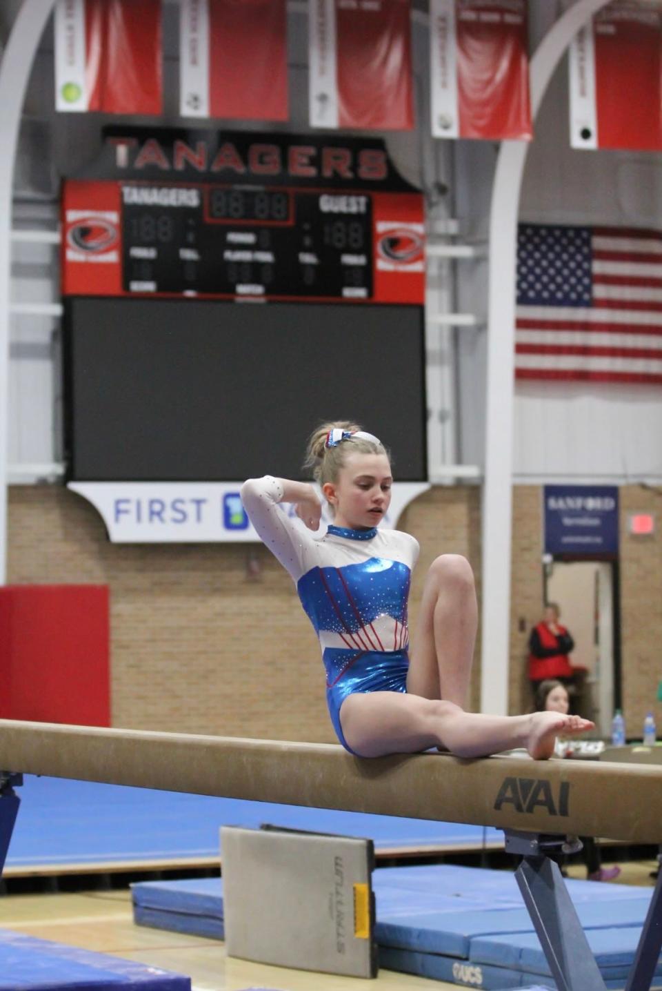 7th grader Sophie DeGroot at a gymnastics meet with Lincoln High School.