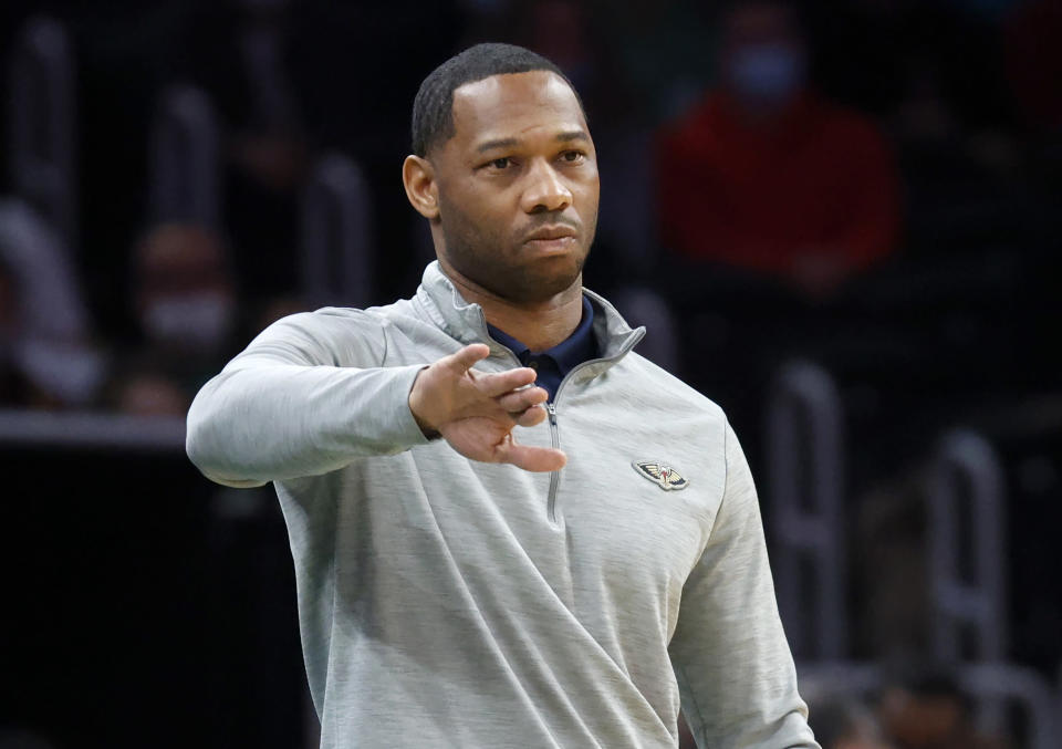 New Orleans Pelicans head coach Willie Green gestures to his team during the first half of an NBA basketball game against the Boston Celtics, Monday, Jan. 17, 2022, in Boston. (AP Photo/Mary Schwalm)
