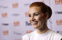 Jessica Chastain, a cast member in "The Eyes of Tammy Faye," smiles at the premiere of the film at the 2021 Toronto International Film Festival, Sunday, Sept. 12, 2021, in Toronto. (AP Photo/Chris Pizzello)