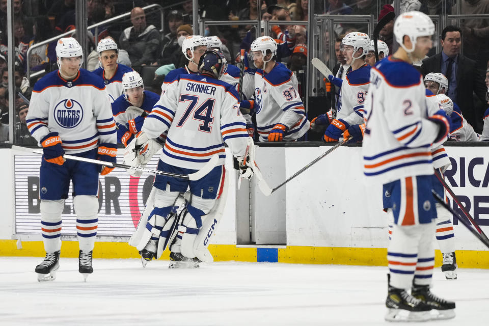 Edmonton Oilers goaltender Stuart Skinner (74) leaves the ice after he was relieved by goaltender Jack Campbell (36) during the second period of an NHL hockey game against the Los Angeles Kings Monday, Jan. 9, 2023, in Los Angeles. (AP Photo/Jae C. Hong)