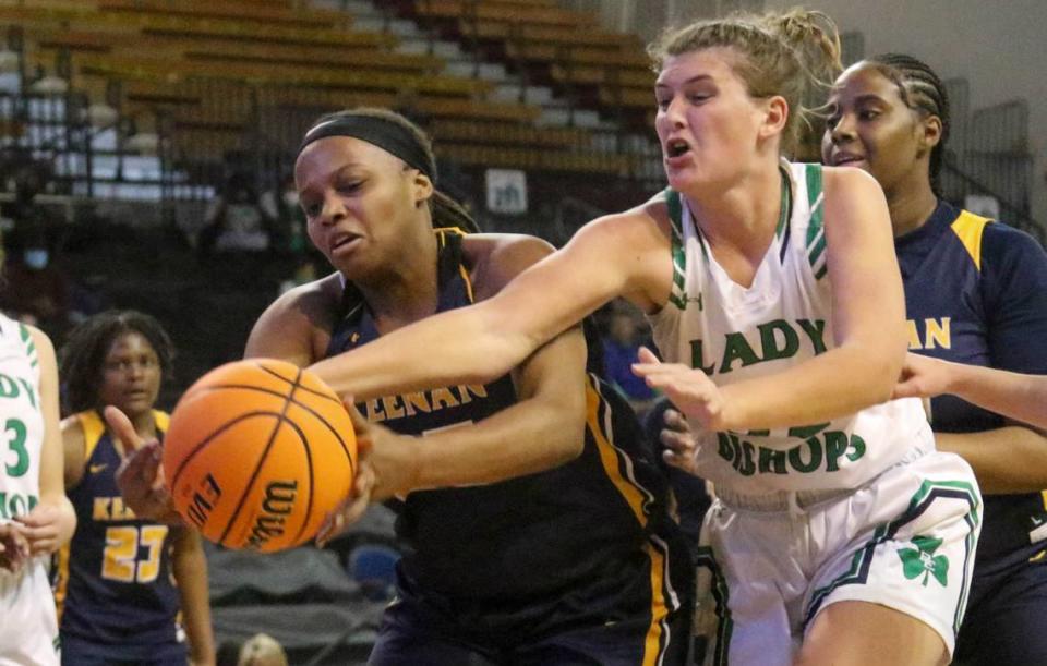 Keenan’s Jailyn Oree (35) battles Bishop England’s Haley Hubbard (32) for a loose ball during the 3A state championship game at the USC Aiken Convocation Center on Friday, March 5, 2021.