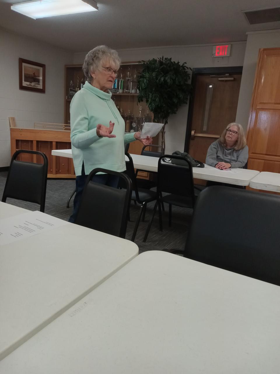 Carolyn Brown informs Art of Gardening members that she is simply Carolyn as Cathy Siwek looks on attentively