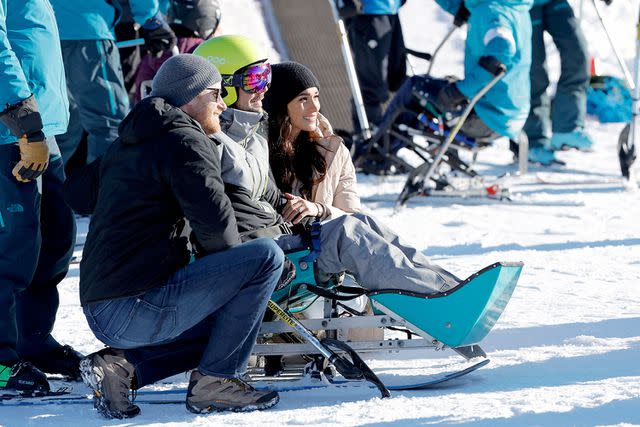 <p>Andrew Chin/Getty</p> Prince Harry and Meghan Markle attend the Invictus Games Winter Training Camp in Canada on Feb. 14, 2024